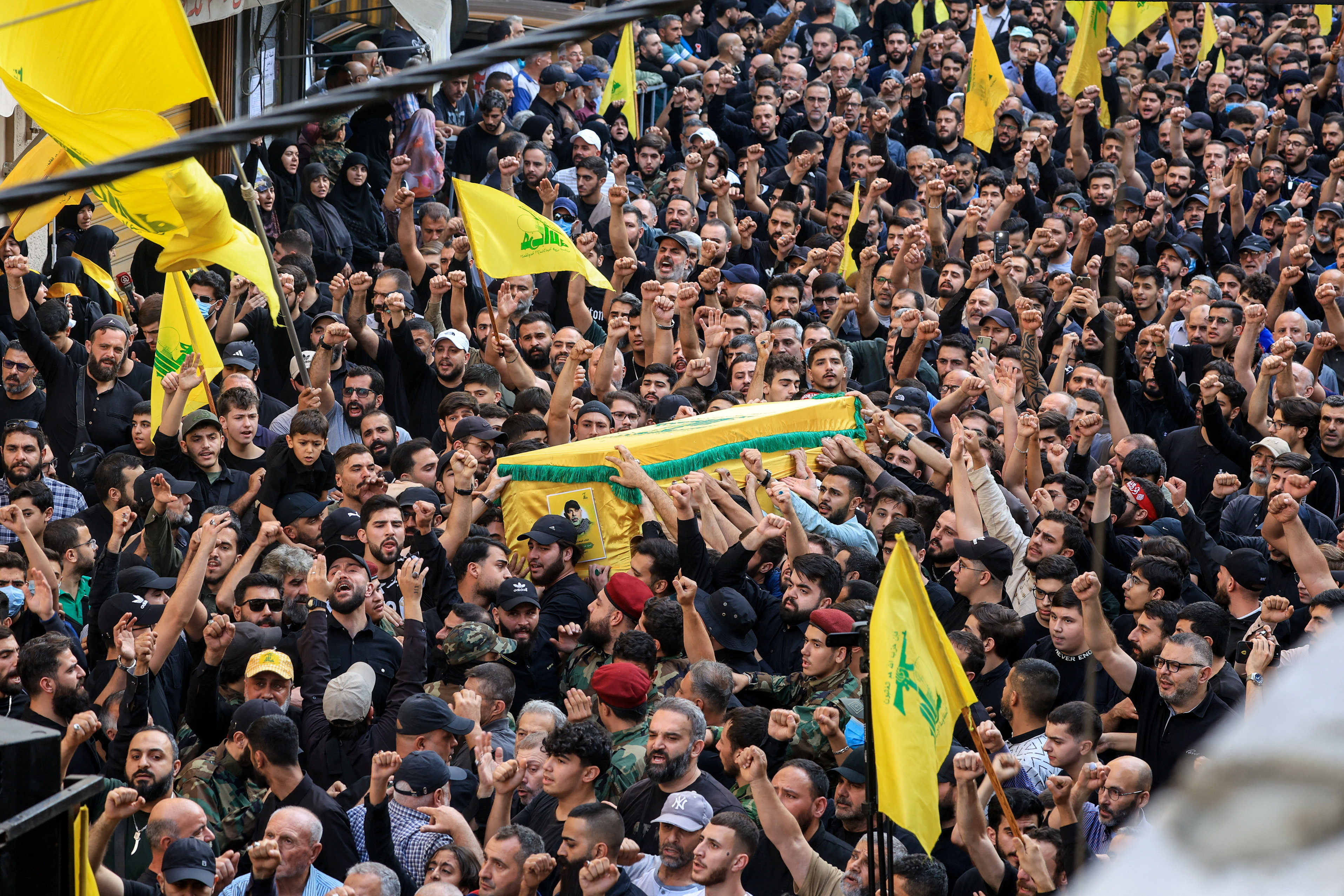 Crowds in Beirut suburbs mourn Hezbollah commander slain by Israel