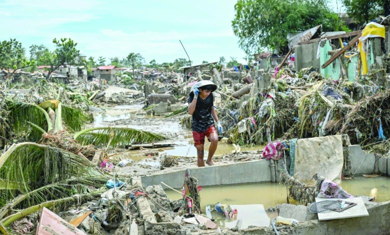Death toll tops 100 in Philippines typhoon Death toll tops 100 in Philippines typhoon