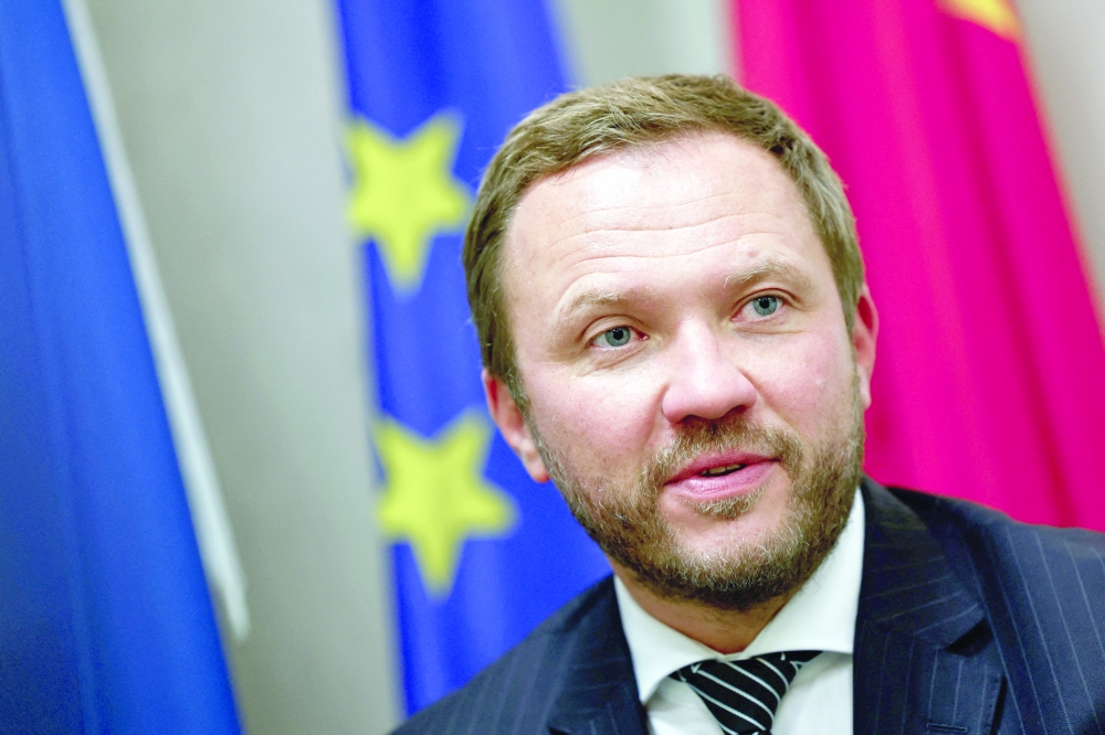 Estonia FM urges China to join pressure on Putin