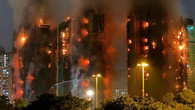 Four dead after fire engulfs residential high-rise buildings in Hong Kong