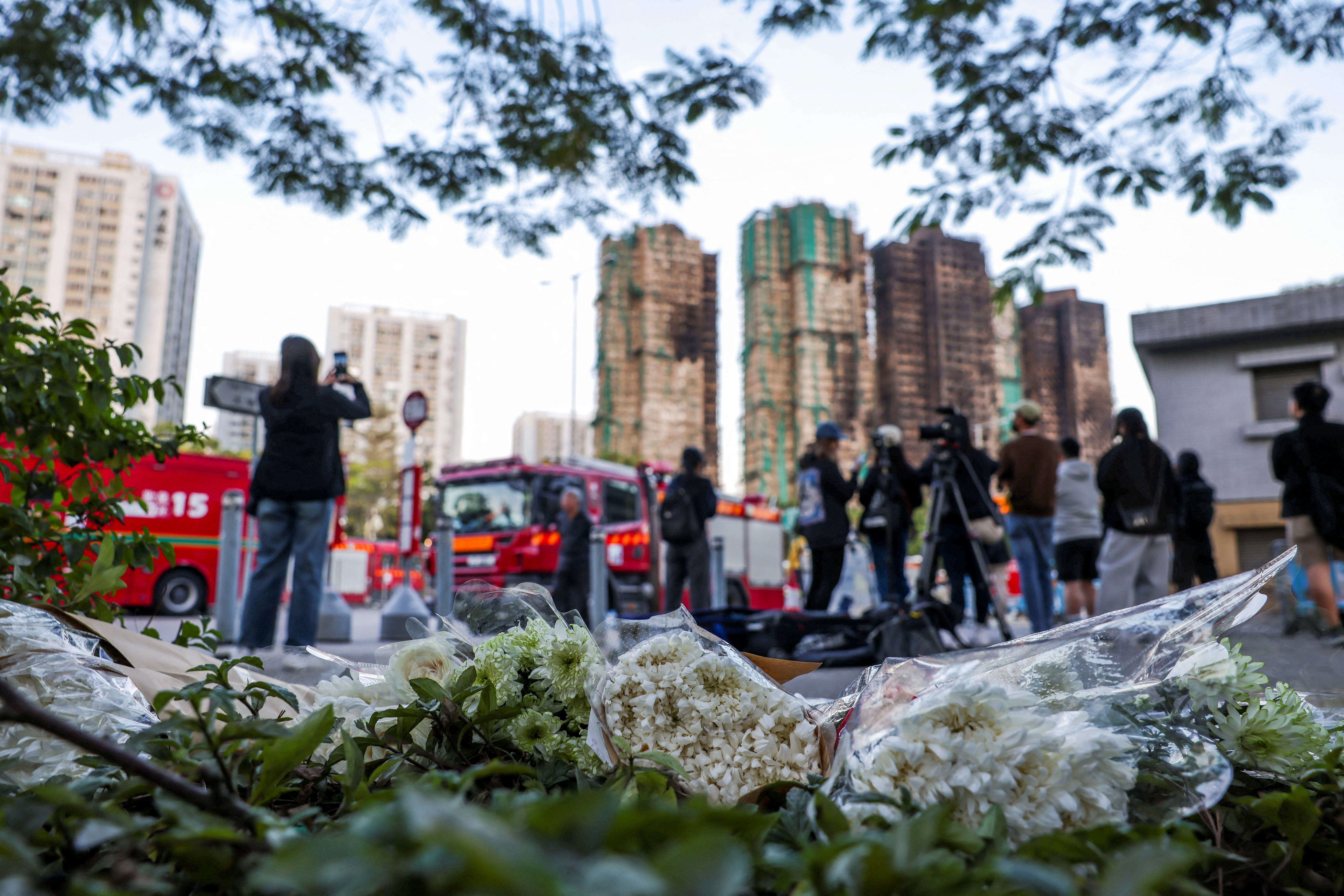 Hong Kong tower fire toll rises to 128, while 200 remain missing