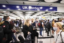 Net immigration to Britain revised down as more Britons emigrate