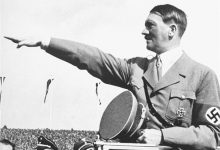 German far-right lawmaker charged with making Nazi salute