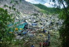 Death toll climbs in Philippines trash site collapse Death toll climbs in Philippines trash site collapse