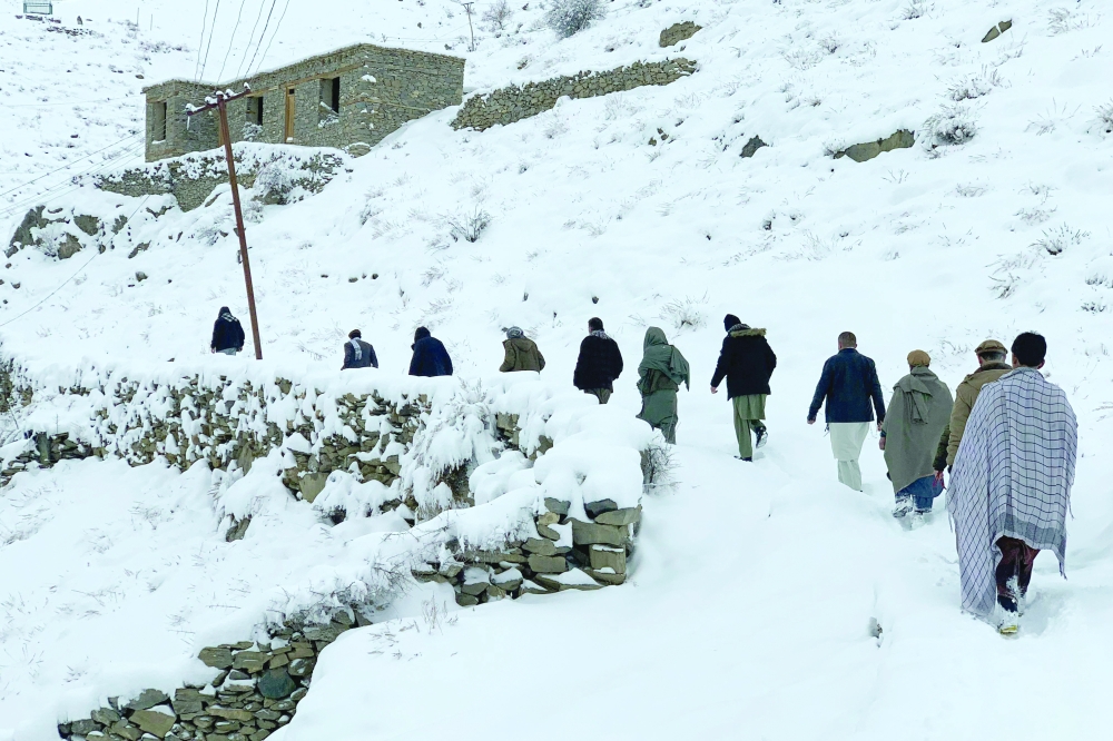 Snow, heavy rain kill 61 in Afghanistan