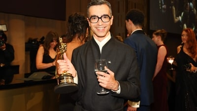 Alexandre Singh posed with his award for Best Live Action Short for Two People Exchanging Saliva at the 98th Annual Academy Awards Governors Ball at the Dolby Theatre in Hollywood, California. (AFP)