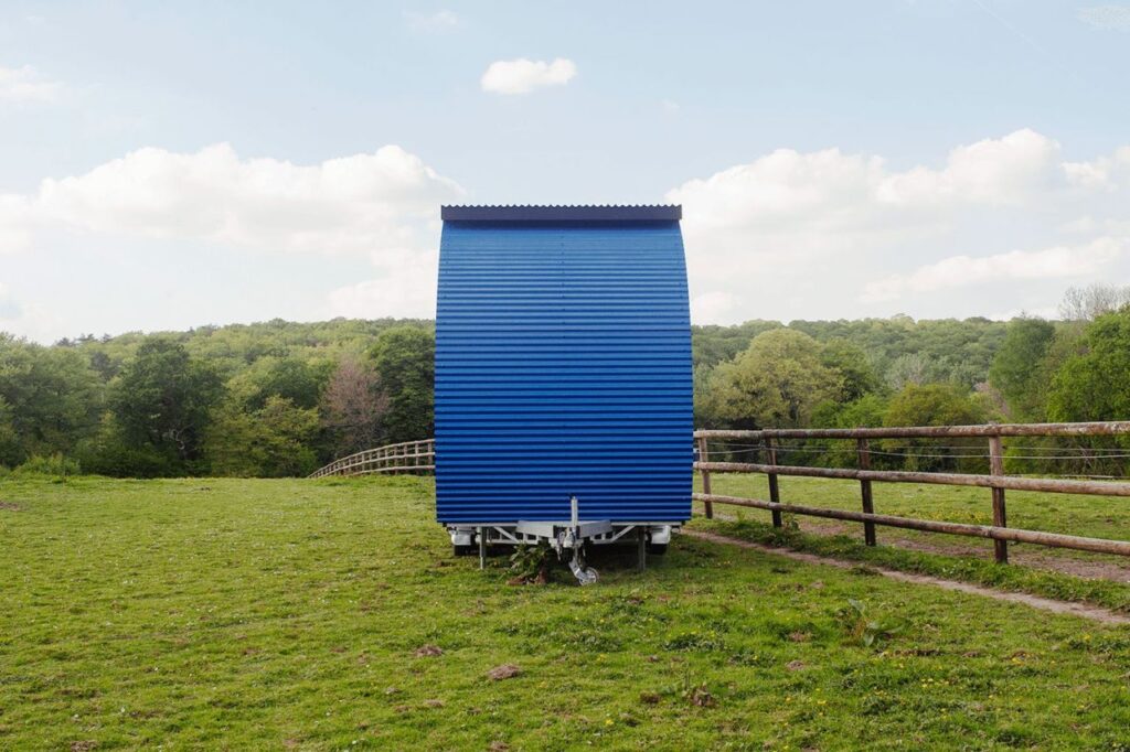 The end part of each modular house is covered with corrugated panels.